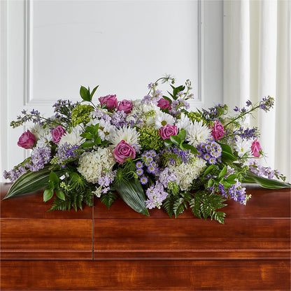 Meadows of Serenity Casket Spray – FUZZY'S FLOWERS GIFTS AND TUXEDOS, Marion OH